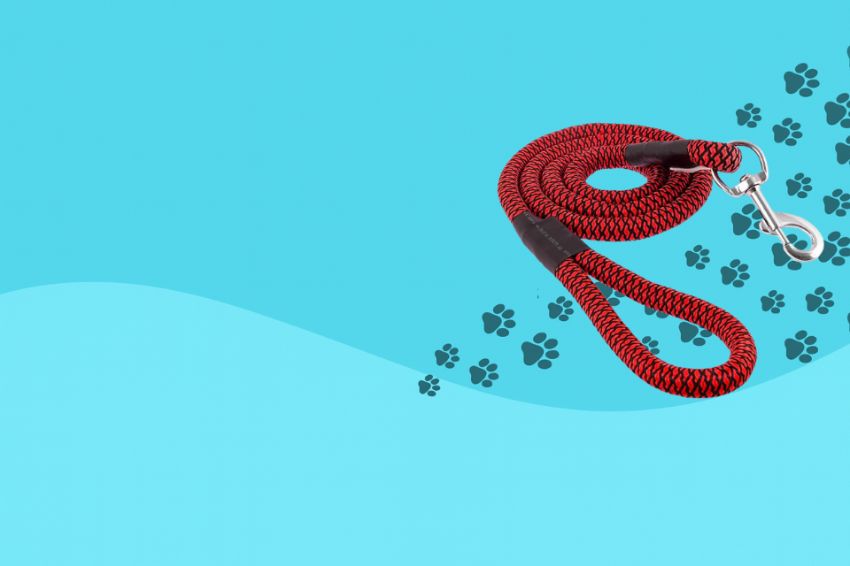 a red rope with a black handle